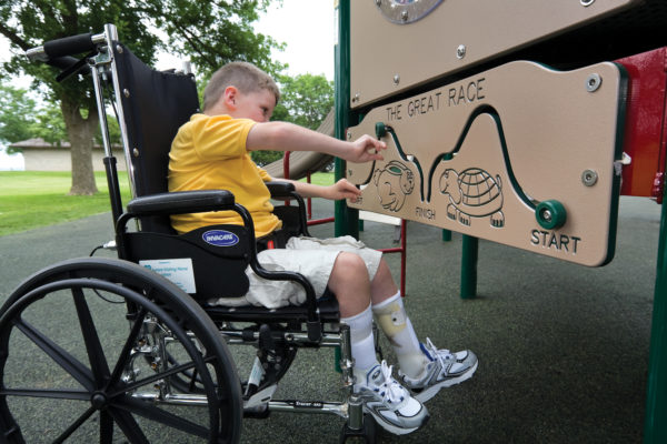 Child in Wheelchair at Playground
